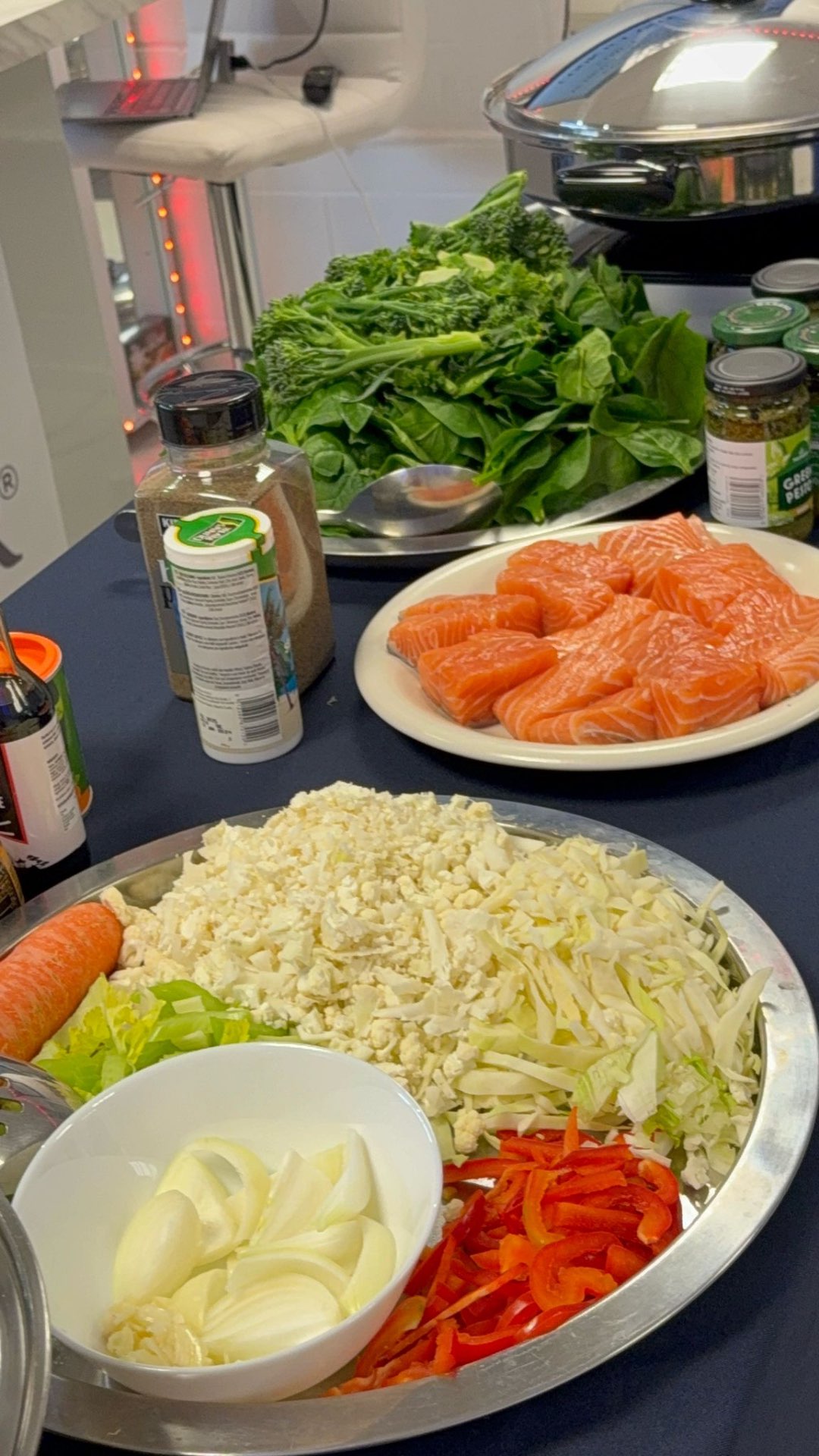 Fresh salmon and vegetables prepared for a cooking demonstration